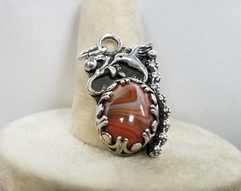 Ladies Humming bird and flower Pendant with 10 x 14 mm Banded Agate.