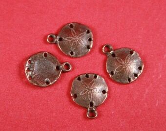 2/9 MADE in GREECE 4 Mykonos casting sand dollar charms , copper sand dollar, tiny copper sand dollar charms (X4285AC)Qty4