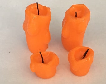 Orange dripping candles