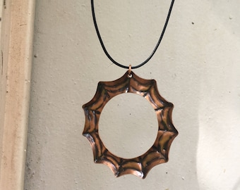 copper spider web necklace with leather cord hand stamped patina halloween