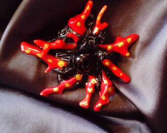 Brooch. Handmade brooch with onyx and coral. Red and black brooch.