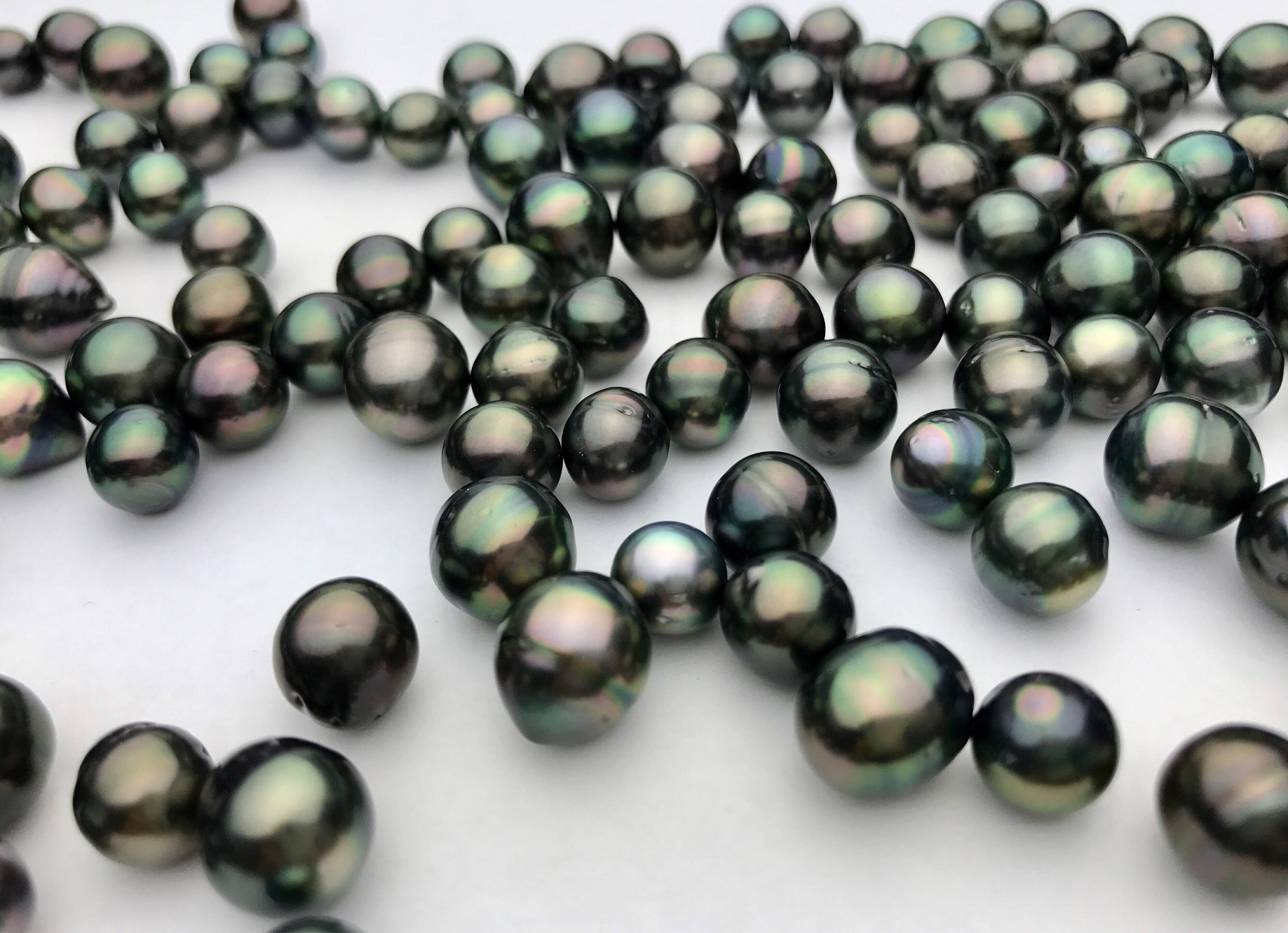 Peacock Tahitian Loose pearls Near Round AA 8mm to 14mm