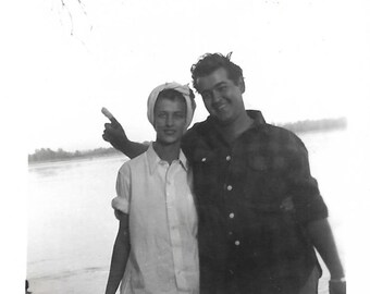 Vintage Snapshot "Ouch!" Smiling Man Holds Up Bandaged Finger Original Black & White Found Photo Vernacular Photography