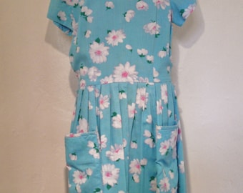 1950s turquoise daisy print dress
