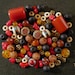 The Nepal beads and agate, coral, yak bone, glass and metal charm
