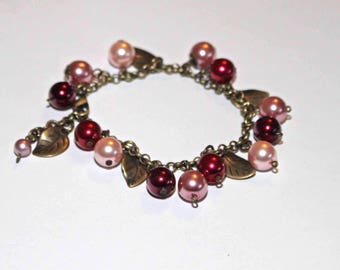 Pink, Burgundy and raspberry charm bracelet.