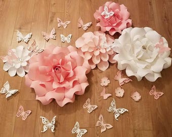 Pink and white paper flowers with butterflies