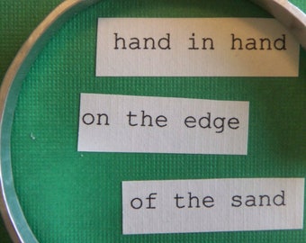 hand in hand on the edge of the sand ...a hand stamped cuff bracelet