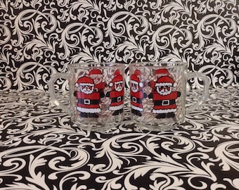 Wrapped in Santa~Set of 2~Santa Clause Mugs~Clear Glass~USA