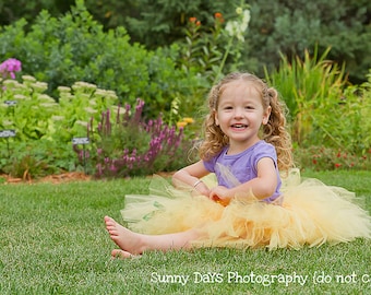 Buttercup Fairy Tutu..size Large (5-7) years...Plus a FREE matching Flower clip...