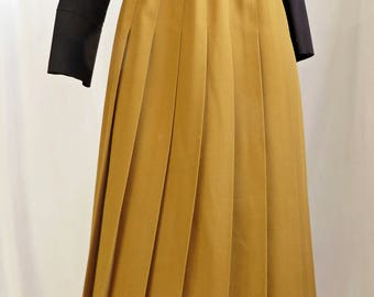 toffee tennis midi skirt. size small medium.