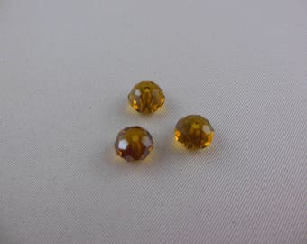 Round flattened Swarovski Topaz color beads
