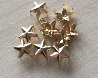Gold tone star claw nails