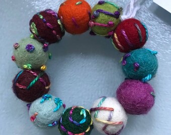 Embroidered wool felt bead bracelet
