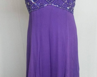 Dress with rhinestones on top