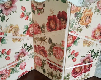 Screen papered in flowers