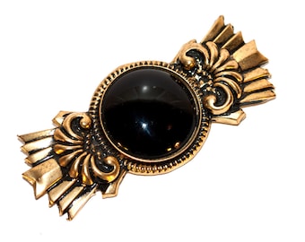 Vintage 80's golden brooch with black stone