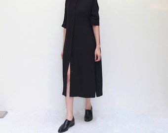 black minimalist shirt dress with mock mandarin collar