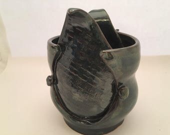 Hand thrown and altered pottery vase
