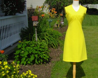 60's bright lemon yellow A-line shift dress, high rise inverted V pieced waist to pointed bodice, sleeveless