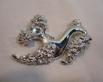 Silver Poodle Pin with Blue Rhinestone Eyes