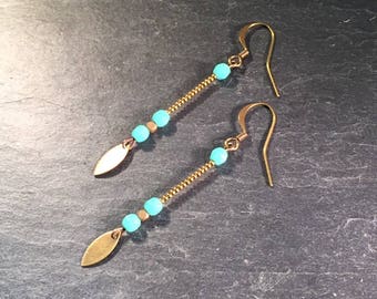Long earrings turquoise blue.