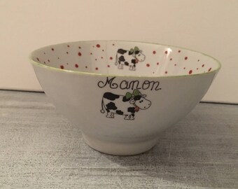 Bowl with "cow" name, red polka dots and green border