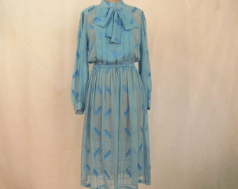 Vintage ~ 80s ~ Sheer Blue Dress ~ Kitten Bow ~ Front Pleats ~ Long Sleeves ~ Elastic Waist ~ Back Zipper