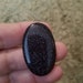 Pair of blue Goldstone oval cabochons.