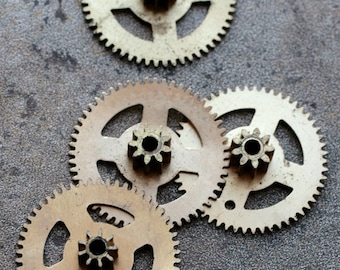 Vintage clock brass gears -- set of 4 -- D16