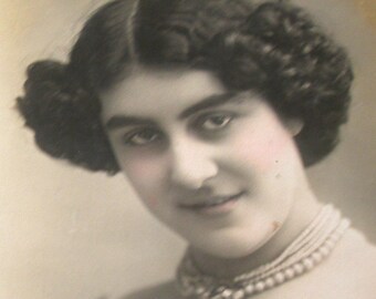 1906 French postcard, Lady with tight curls. RPPC real photo postcard, paper ephemera.