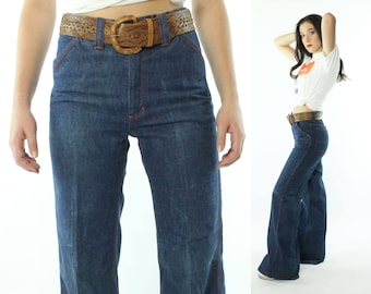 Vintage bell bottom jeans / 1970s hip hugger super wide flared