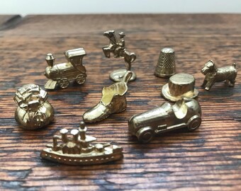 Set of 9 Gold Pewter Deluxe Edition Monopoly Game Pieces / Monopoly Tokens: Thimble, Top Hat, Scottie Dog, Train, Boot, Race Car, Ship