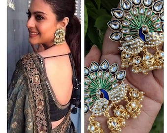 Indian jewelry, traditional jewelry, handcrafted earrings, gold plated celebrity peacock earrings lined with fine pearls