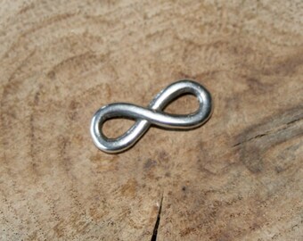 Silver spacer metal infinity connector