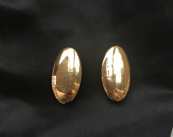 Givenchy gold tone clip on earrings