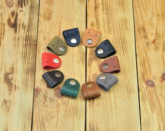 Cable clamp, Cable clips, Cable cord, Cable cover, Cable holder, Cable organizer, Cable ties, Cable wrap, Cord holder, Cord keeper