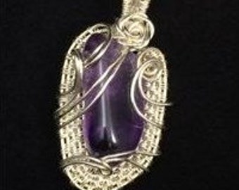 Sterling silver amethyst wire wrapped pendant on a sterling silver chain