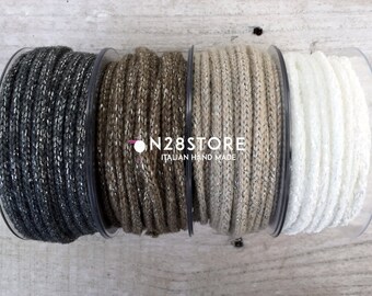 Beautiful assortment of ribbons and cords in different colors, crafting, haberdashery, sewing supplies