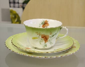 Green floral detailed vintage tea cup and saucer with side plate, perfect for afternoon tea