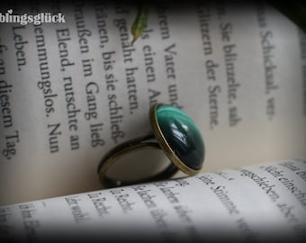 Bronze ring with green cat eye