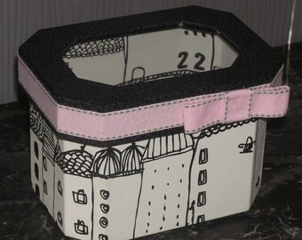 White, black and pink storage box