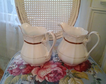 Pair of vintage pitchers