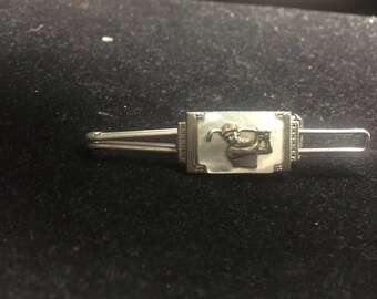 Vintage money clip with golfer