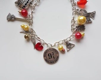 Harry Potter charm bracelet Gryffindor colours.