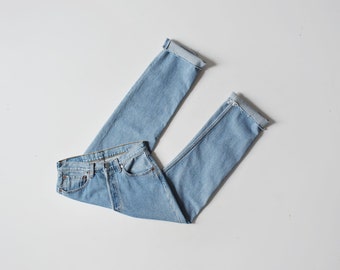levis 501 jeans / 30 waist / vintage high waist button fly jeans with raw hem