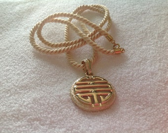 Pendant necklace SARAH COVENTRY Chinese symbol