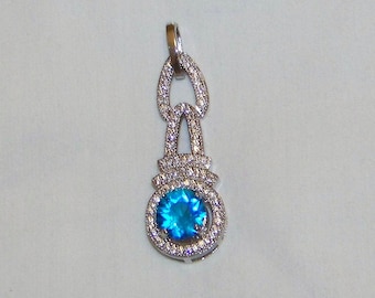 Swiss Blue Topaz And Silver Pendant