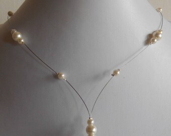 Wedding necklace cascade of ivory pearls