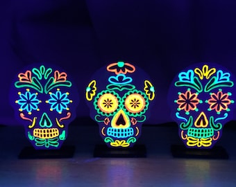 Set of black light skull decorations